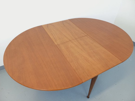 Image 1 of Vintage Scandinavian style round teak dining table from the 1950s/60s with extension