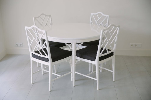 Dining room table and 4 chairs Jonathan Adler style. In 2024 the seats of the chairs are upholstered in black fabric.