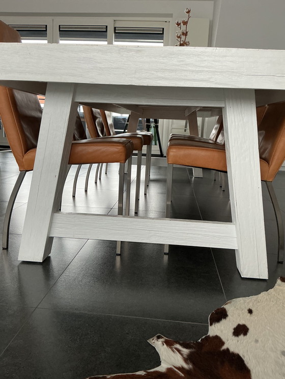 Image 1 of Sala da pranzo completa con 8 sedie in pelle, 3 sgabelli da bar e tavolino da caffè