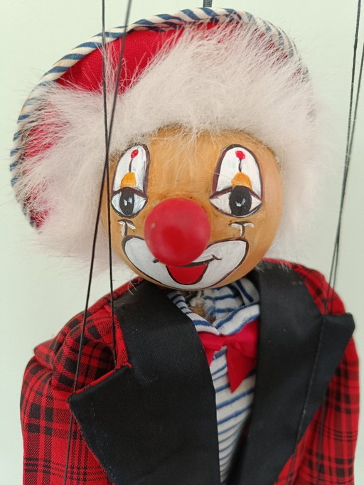Antique clown puppet