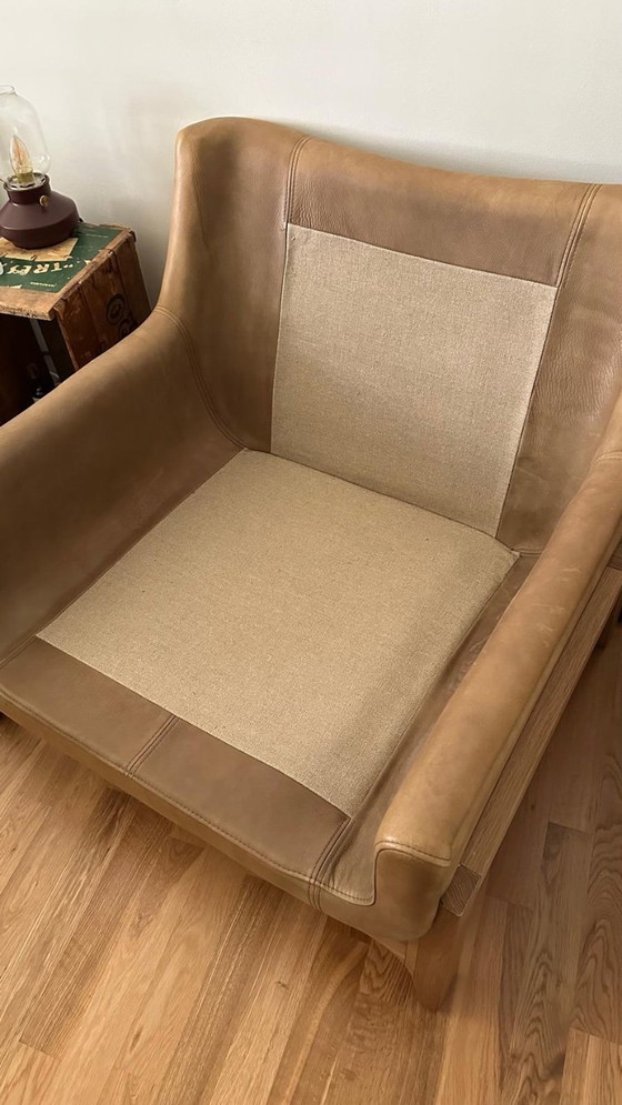 Image 1 of Sillón Woodnest en roble macizo y piel Cheyenne.