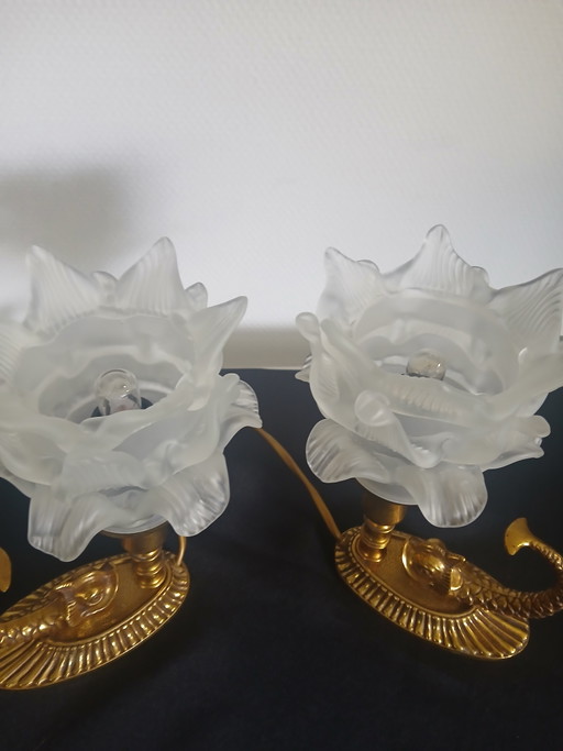 Pair of tulip-shaped dolphin lamps.