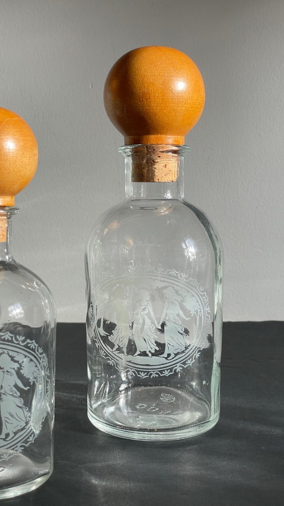 Image 1 of Vintage Engraved Glass and Wood Bottles