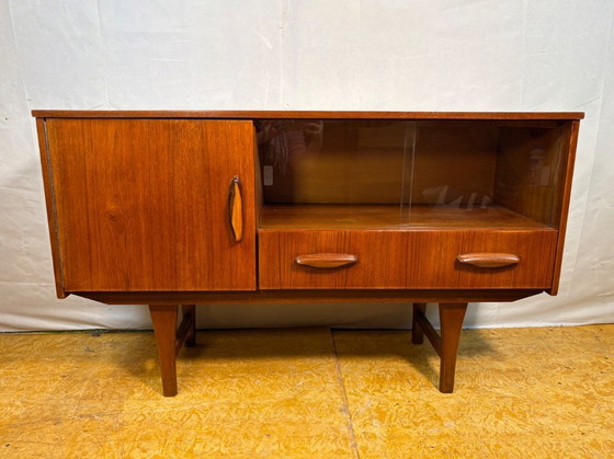 Image 1 of Mid-Century Retro Vintage Teak Small Sideboard by Jentique 1960s  Sliding Glass Doors • Elegant Danish Influence • Perfect Compa