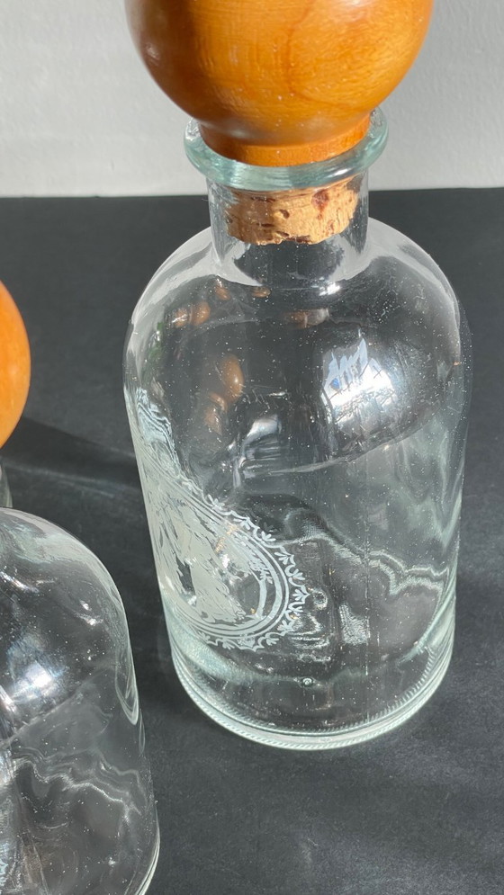 Image 1 of Vintage Engraved Glass and Wood Bottles