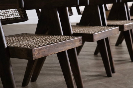 Set van 8 Pierre Jeanneret bureaustoelen van riet, India, jaren 1950. – Eetkamerstoelen, Wood (photo 18 of 20)