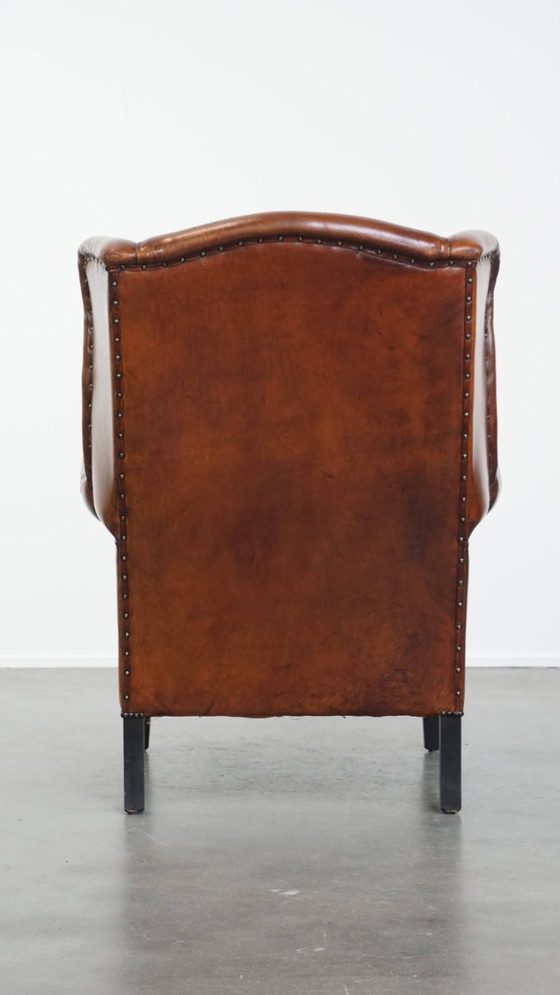 Image 1 of Grote vintage schapenleren oorfauteuil