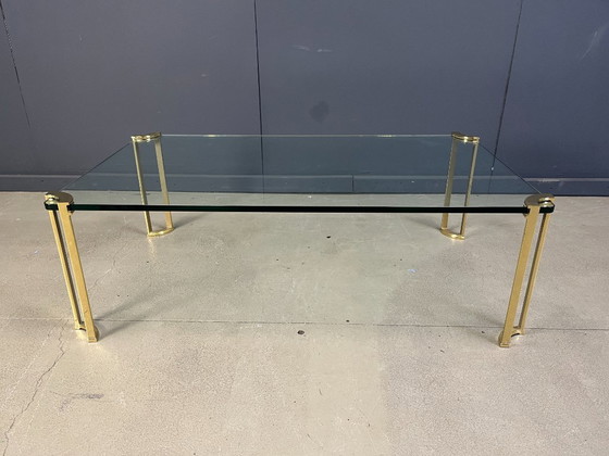 Image 1 of Salontafel in Peter Ghyczy-stijl, gemaakt van messing en glas.