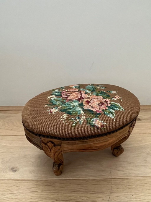 Vintage footstool with petit point embroidery