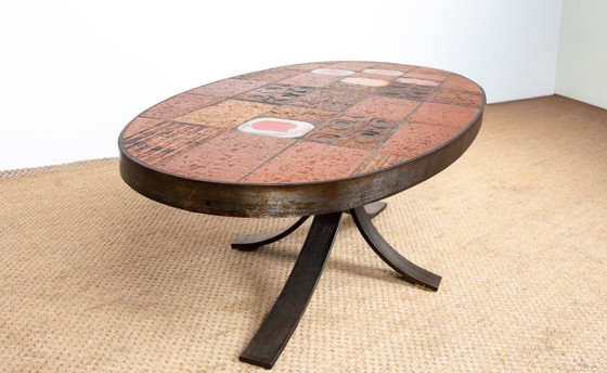 Image 1 of Tavolino da caffè in pietra lavica, ceramica e acciaio, disegnato da Jean Jaffeux nel 1960.