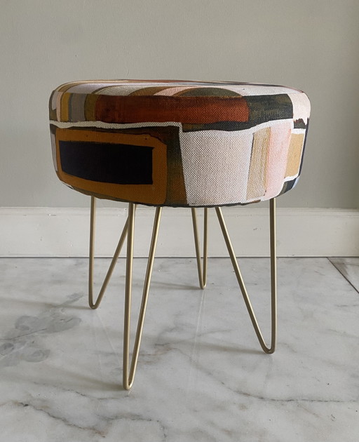 Recycled stool upholstered with designer fabric