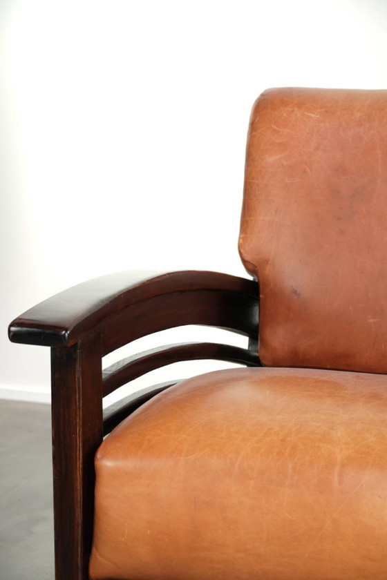 Elegant cowhide armchair with beautiful details in timeless Art Deco design – Leather, Klassiek (photo 10 of 12)