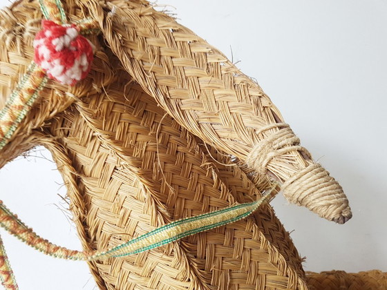 Image 1 of Bloempotstandaard in de vorm van een ezel op wielen, vintage jaren 50, rotan, riet, stro.