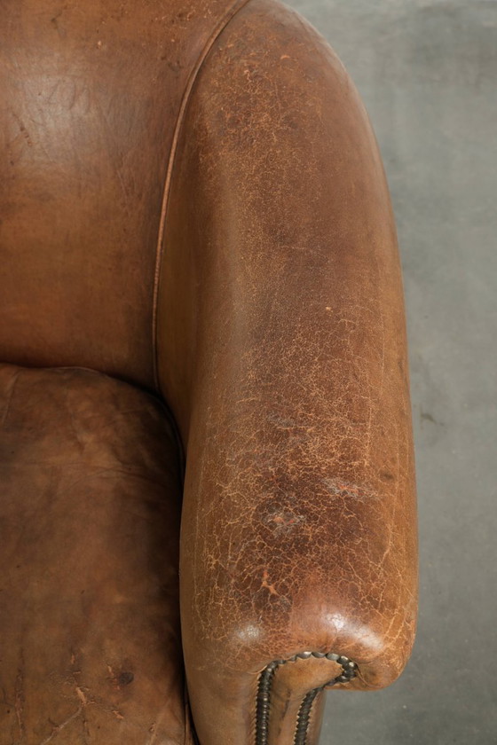Sturdy Worn Vintage Sheepskin Club Armchair With A Comfortable Seat And A Beautiful Color – Leather (photo 8 of 13)