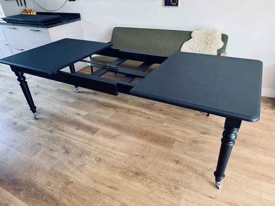 Image 1 of Eichholtz coulissen tafel (mat zwart)