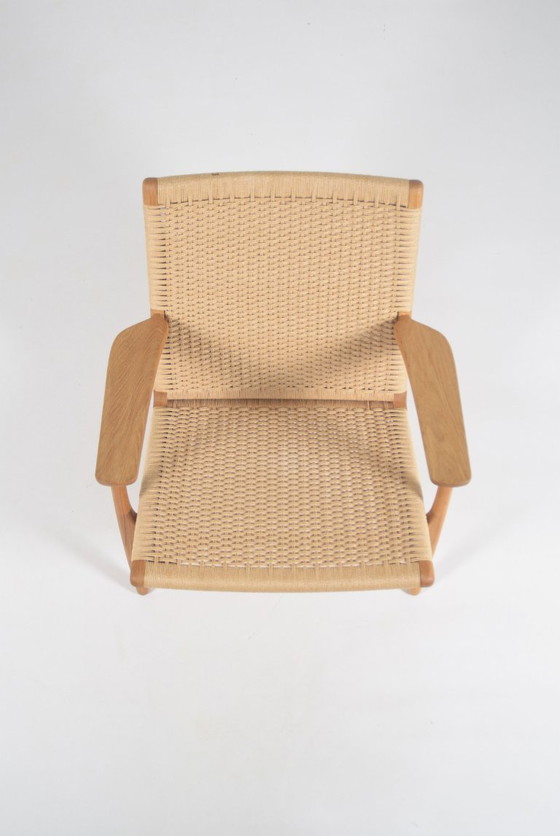 Poltrona danese CH25 disegnata da Hans J. Wegner per Carl Hansen & Søn, Poltrone, Legno, Altro, Marrone (foto 7 di 10)