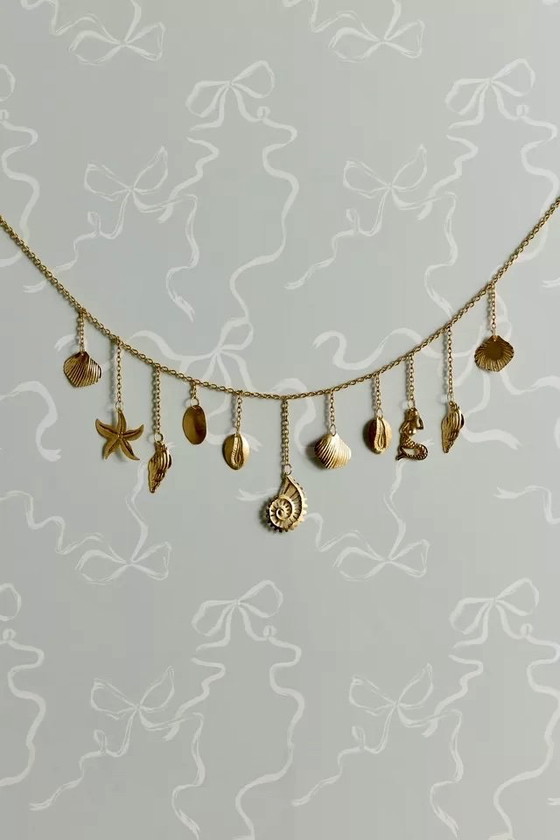 Image 1 of Wanddeco wanddecoratie met gouden zeethema-bedels