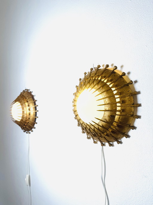 A SET OF BRUTALIST SUNBURST WALL LIGHTS, FRANCE, 1960s