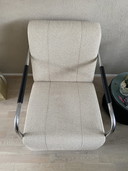 2 armchairs with steel frame and bouclé upholstery