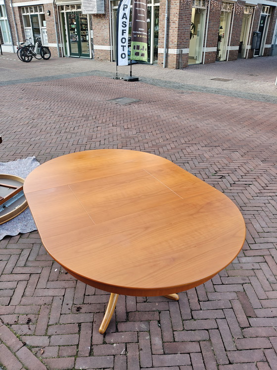 Image 1 of Round extendable dining table