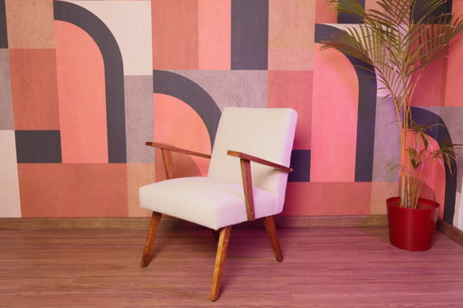 Poltrona vintage beige bouclé in legno di noce 1960