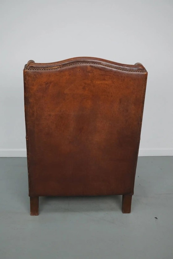 Image 1 of Vintage Nederlandse clubfauteuil van cognackleurig leer