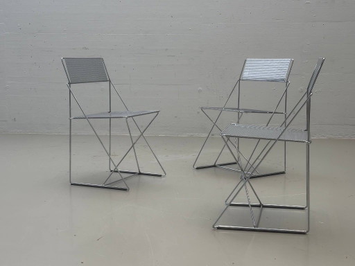 X-Line stoelen van Niels Jørgen Haugesen, jaren 70 – kuipstoelen, Metal (photo 2 of 14)