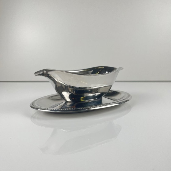 Image 1 of Silver-colored Empire-style metal gravy boat