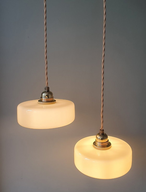 Image 1 of Vintage pendant lamp set (2) of yellow pastel opaline glass. Art Deco design.