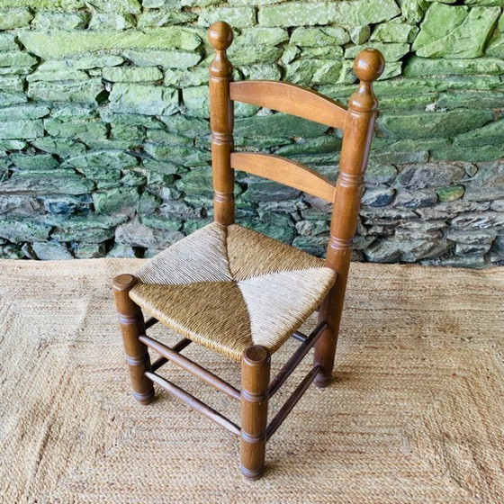 Image 1 of Set van 4 massief houten stoelen met rieten zittingen