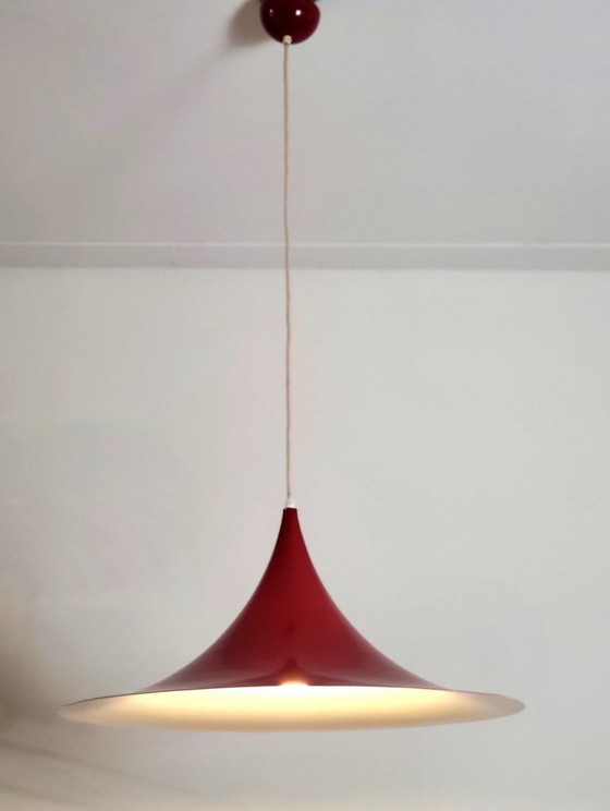 Image 1 of Set of 2 vintage XL semi- or trumpet pendant lamps in deep red