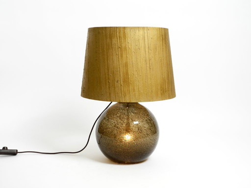 Large, elegant, very rare 1970s Putzler table lamp with illuminated glass body and shade made of golden dupion silk
