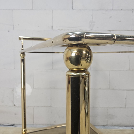 Vintage golden brass bar cart / trolley smoked glass shelves (photo 9 of 15)