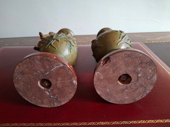 Image 1 of Pair of Art Nouveau spelter vases, circa 1900, with cherubs and a double patina