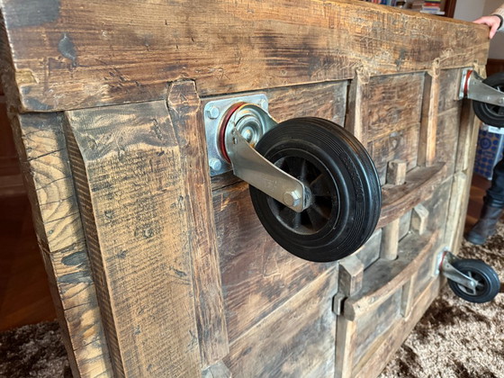 Image 1 of Unique industrial coffee table made of (monastery) wood on wheels