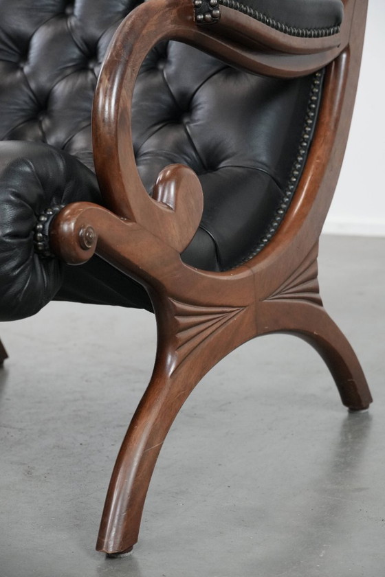 Image 1 of Poltrona Chesterfield in pelle di vacchetta nera, classica e confortevole, in buone condizioni