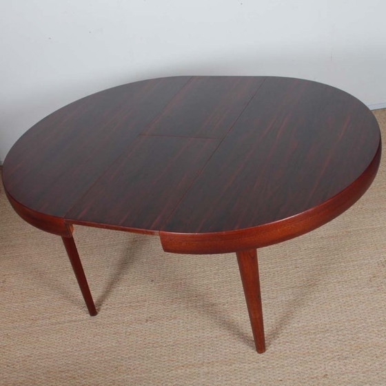 Image 1 of Table de repas ronde extensible en palissandre de Rio, 1960