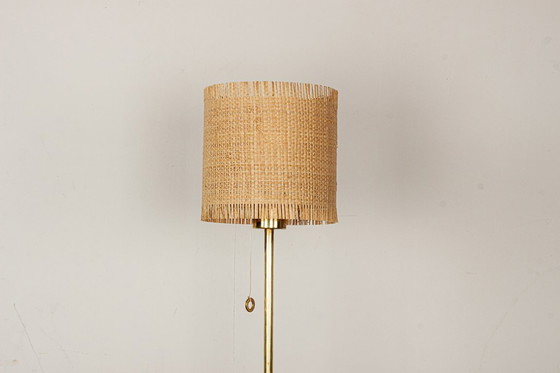 Image 1 of Lampadaire Suédois en Laiton, pied en fonte, modèle G 019 par Bergboms 1960.