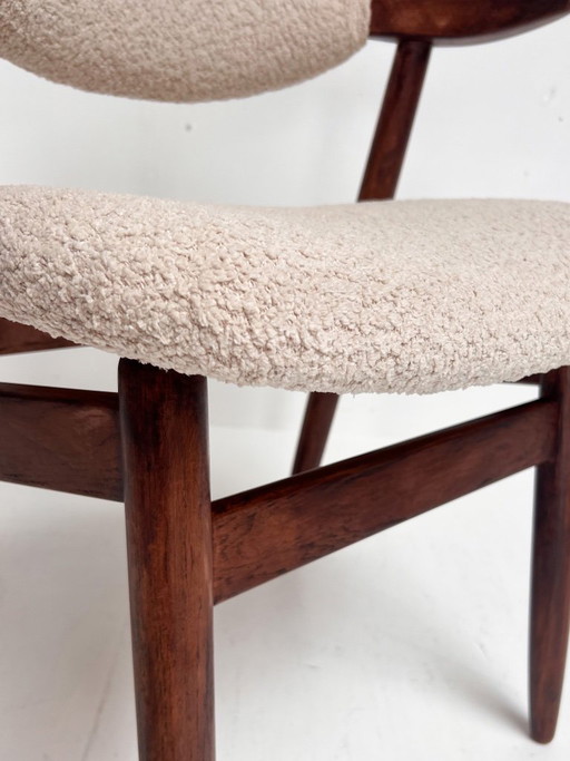 Newly upholstered cowhorn chair, 1970s