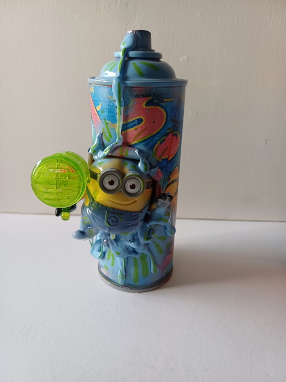 Image 1 of Les Minions peuvent être de l'art pop et de rue, comme Carl, Stuart et Bob.