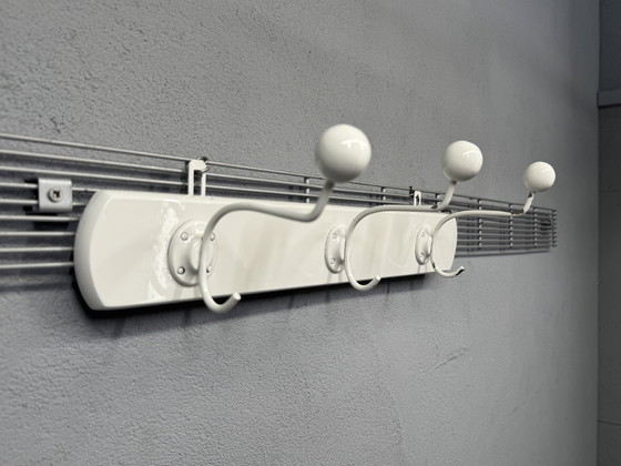 Image 1 of Mid - Century coat rack sleek and timeless design