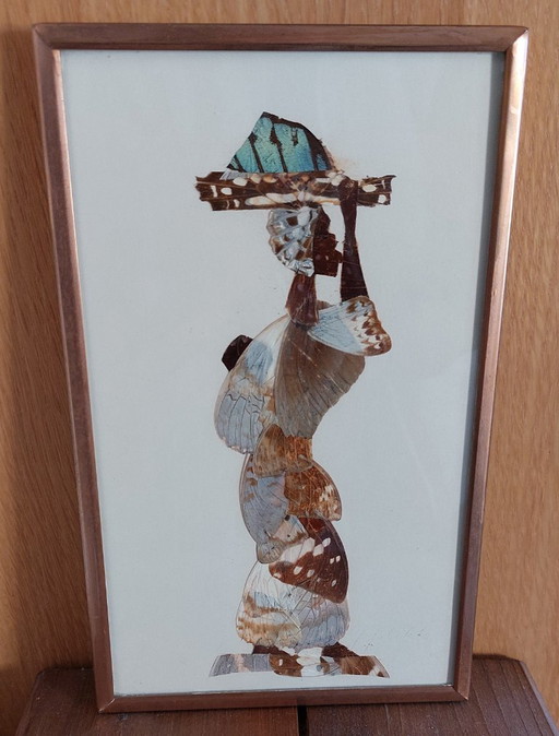 Des œuvres d'art vintage représentant des ailes de papillon – dont une silhouette encadrée de femmes africaines