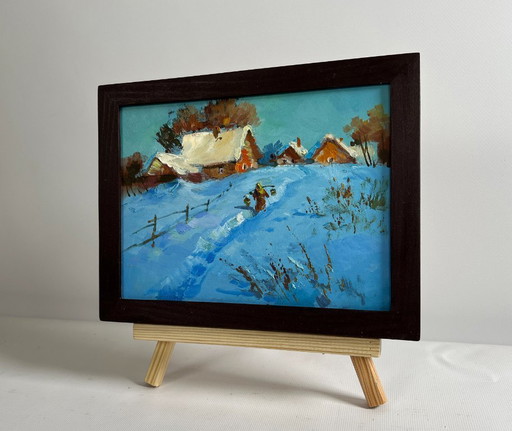 Origineel olieverfschilderij: Winterdorpslandschap met een besneeuwd pad in het dorp.