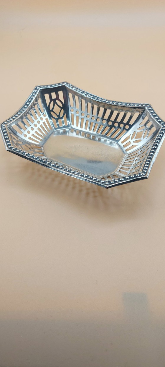 Image 1 of Lot of silver-plated items including candlestick, small bowl, tea strainer