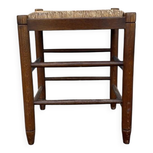 Vintage Hocker mit Strohsitz.