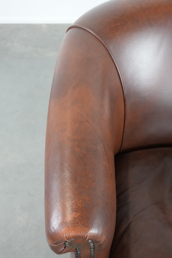 Image 1 of Cognac-colored cowhide leather club armchair in English style with a luxurious appearance