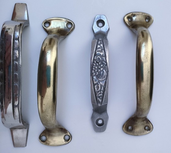 Image 1 of sette maniglie Art Déco in argento e ottone