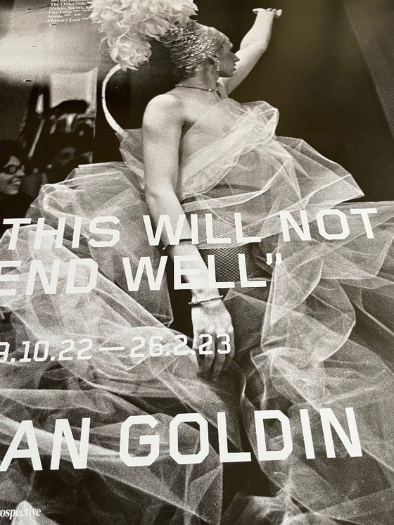 Image 1 of Nan Goldin, exibition poster  “This Will Not End Well” Naomi presenting a stage show, Boston (1973) fran The Other Side, 1992-20