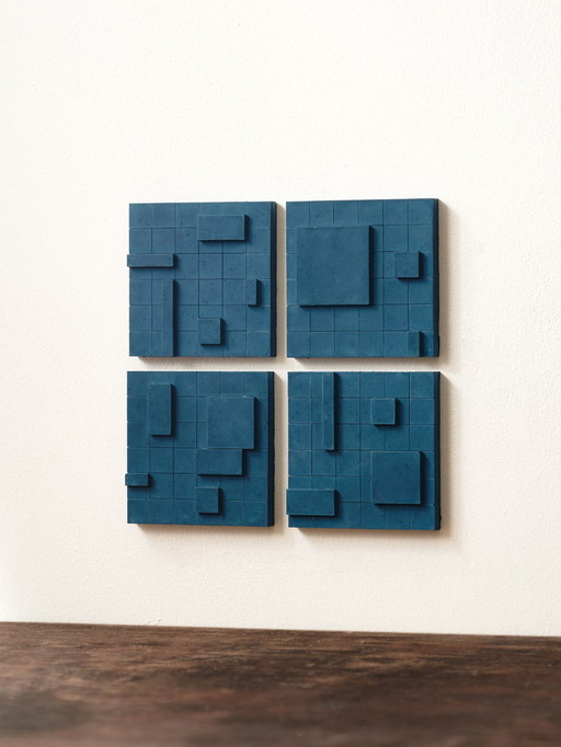 Set of 4 brutalist wall objects.