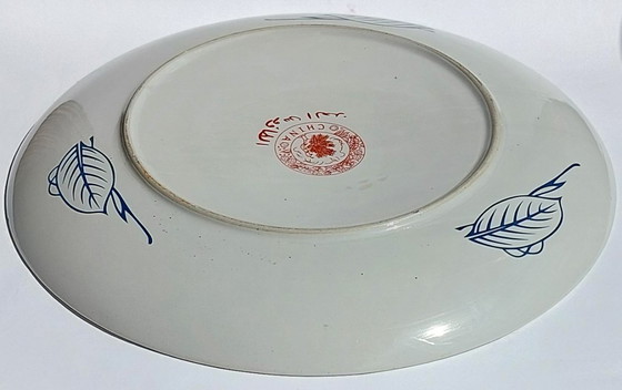 Image 1 of Large Chinese decorative plate with traditional Middle Eastern and Islamic patterns.
